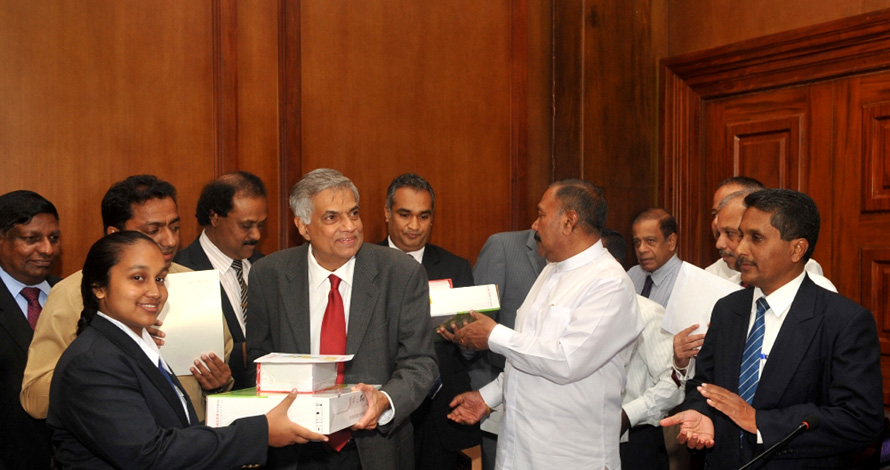 Prime Minister awards Singer Ultra Notebooks to top ten Ordinary Level performers