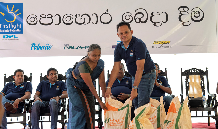 DPL distributes fertiliser to 1500 smallholder rubber farmers under Firstlight initiative