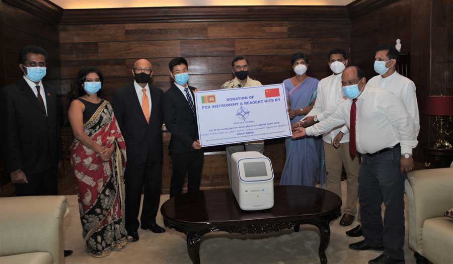 businesscafe image Port City Colombo donates PCR equipment and testing kits