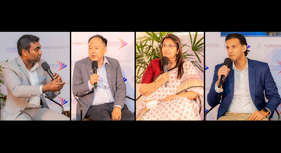 Futurist Dr. Clarence Tan and IAN President Padmaja Ruparel speak at LAN Investors Night