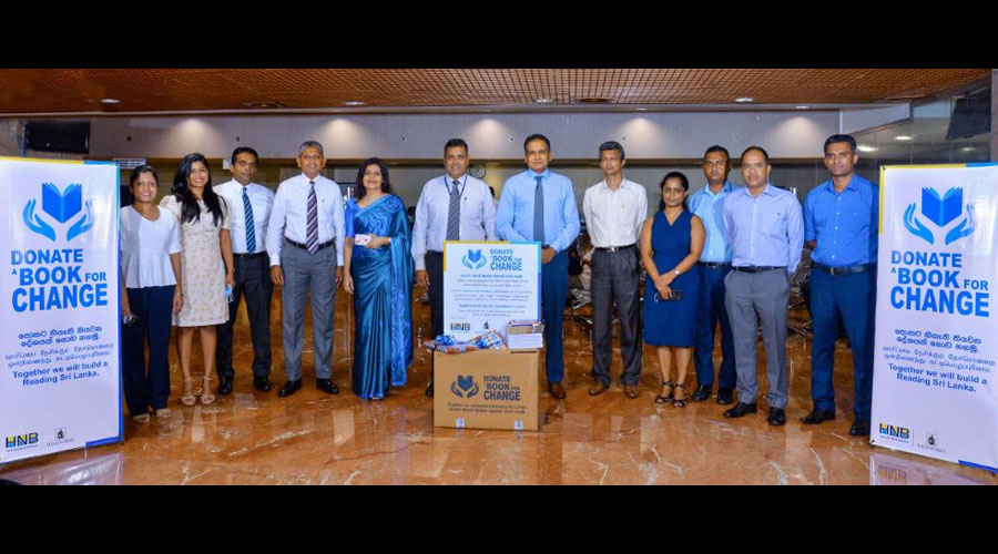 HNB partners M.D. Gunasena to donate books to rural schools
