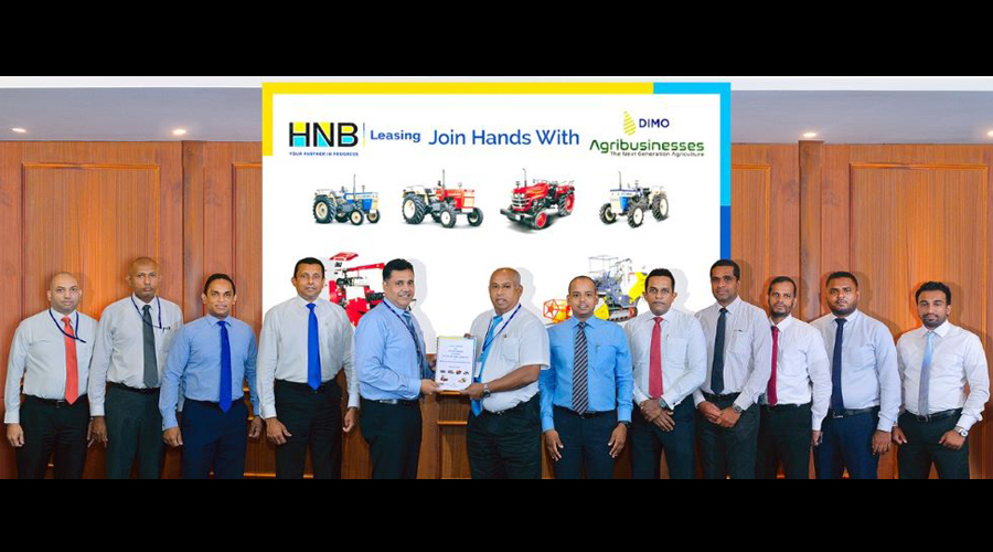 HNB strengthens partnership with DIMO to enhance local agricultural mechanisation
