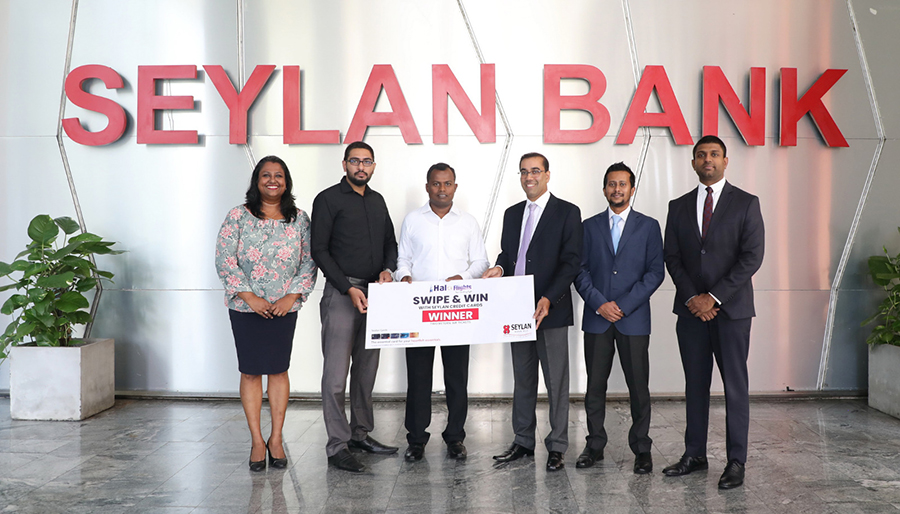 Seylan Cards and Halo flights present return air tickets to winner of August s Swipe and Win draw