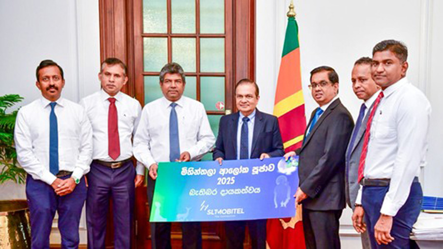SLT MOBITEL steps forward to support the Poson Aloka Pooja