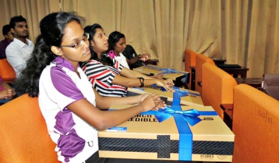 Commercial Bank donates laptops to undergrads with vision difficulties